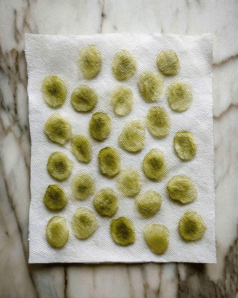 Air Fryer Fried Pickles 2 Air fryer fried pickles slices drying on paper towel before coating