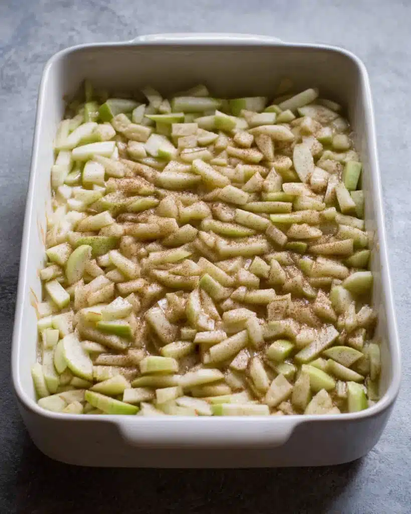 Apple Cheesecake Bars (Perfect for Thanksgiving) 5 Chopped apple layer added to cheesecake filling for Apple Cheesecake Bars