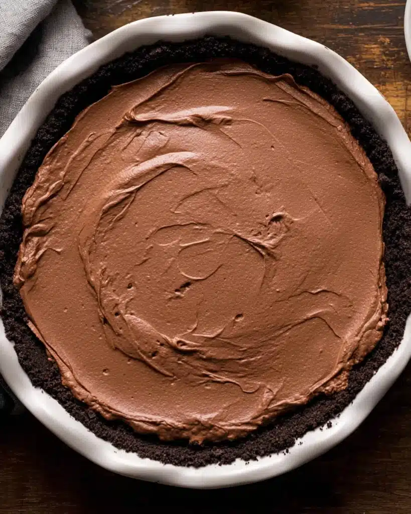 Chocolate Peanut Butter Pie (Thanksgiving Favorite) 6 Chocolate layer spread into Oreo crust for peanut butter pie