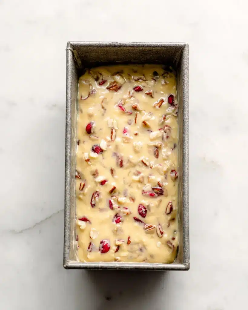 Cranberry Nut Bread – A Festive Holiday Favorite 3 Cranberry nut bread batter in loaf pan before baking