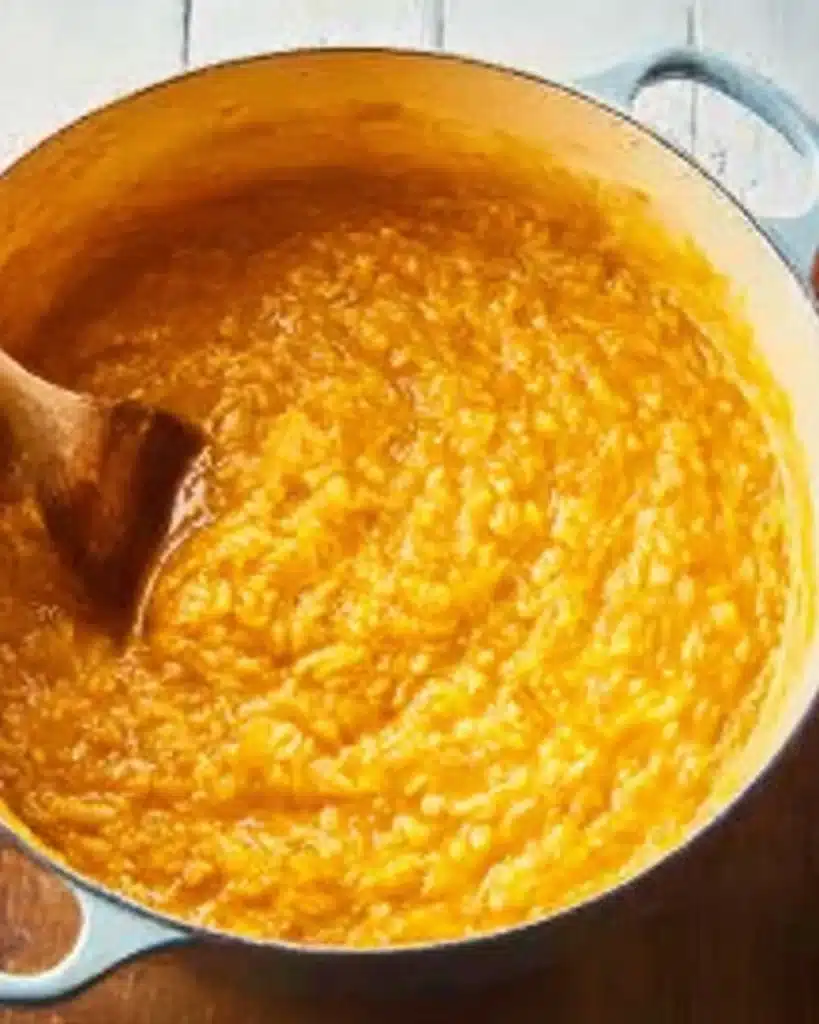 Creamy Baked Pumpkin Risotto 4 Creamy baked pumpkin risotto in a Dutch oven ready to serve