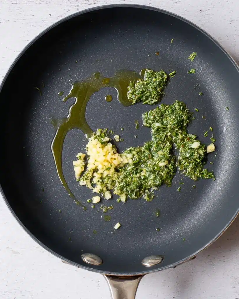 Creamy Pumpkin Pasta – A Cozy Halloween Idea 2 Garlic and sage sautéing in olive oil in a skillet