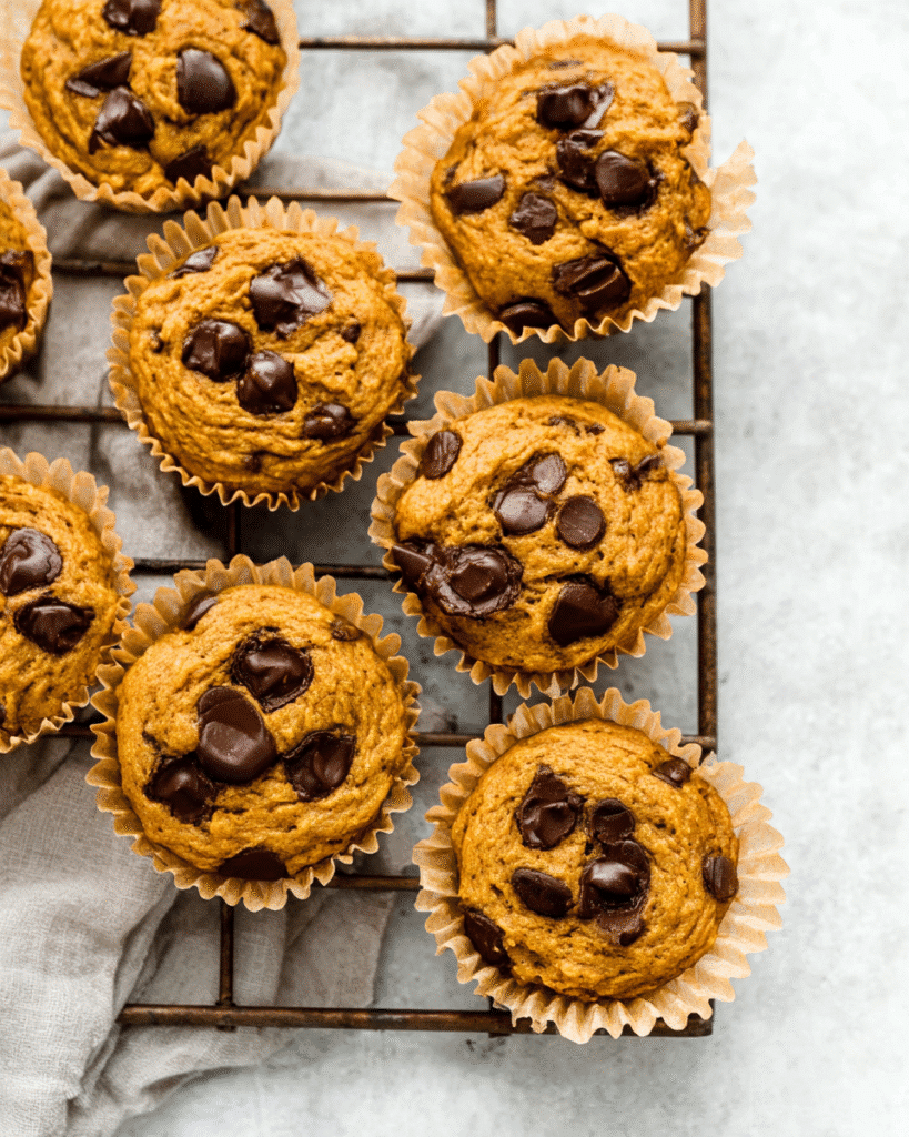 Pumpkin Chocolate Chip Protein Muffins 3 Pumpkin chocolate chip protein muffins cooling on rack