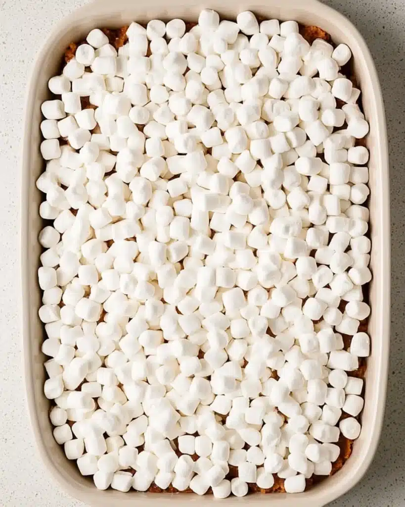 Sweet Potato Casserole with Marshmallows 7 Unbaked sweet potato casserole topped with mini marshmallows