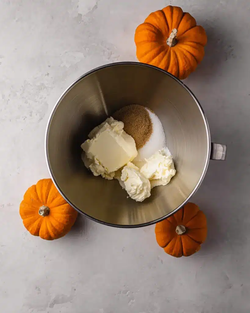 The Best Pumpkin Cheesecake Bars Ever 4 Cream cheese and sugar in mixing bowl for cheesecake filling