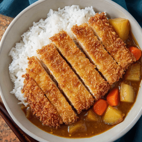 Crispy and Flavorful Tofu Katsu Recipe (Dinner Favorite) 10 Crispy tofu katsu with rice and Japanese curry in a bowl