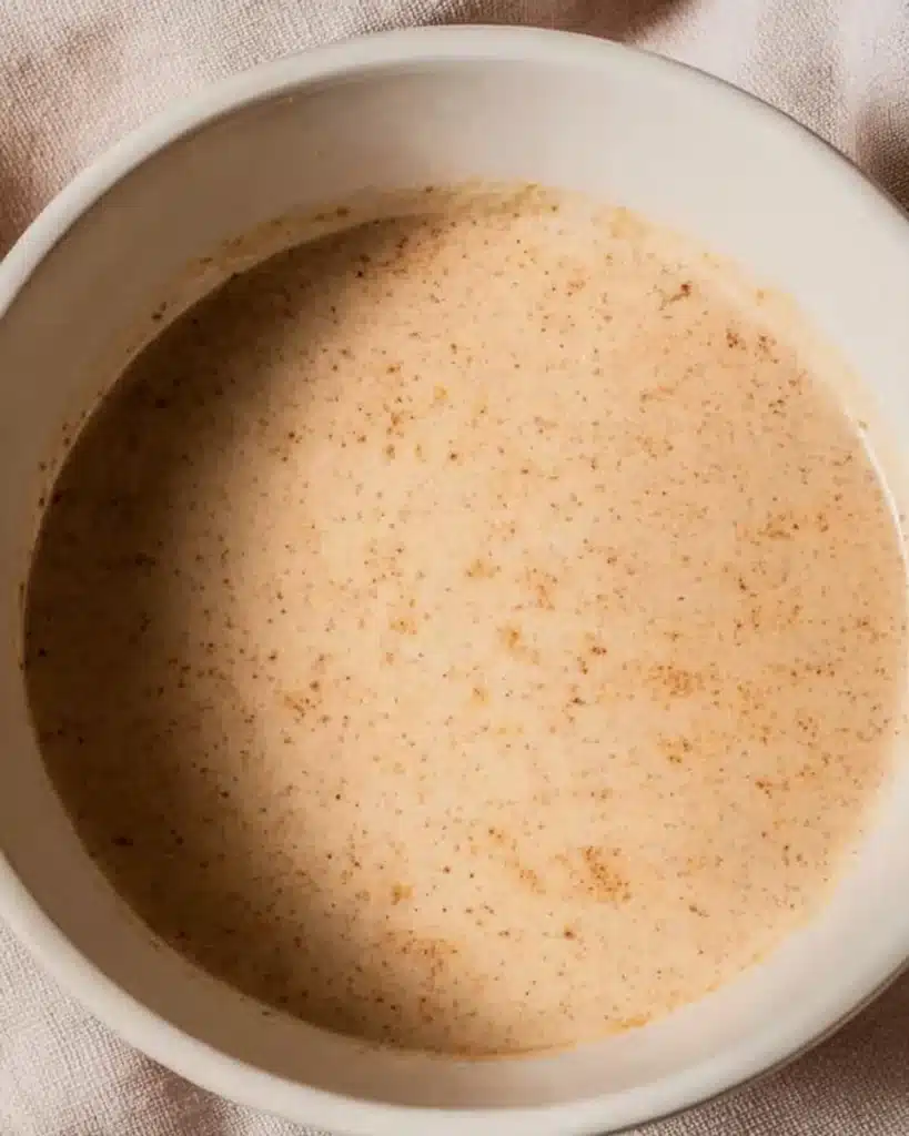 Bread Pudding with Vanilla Sauce 4 Bread pudding custard mixture with cinnamon and nutmeg