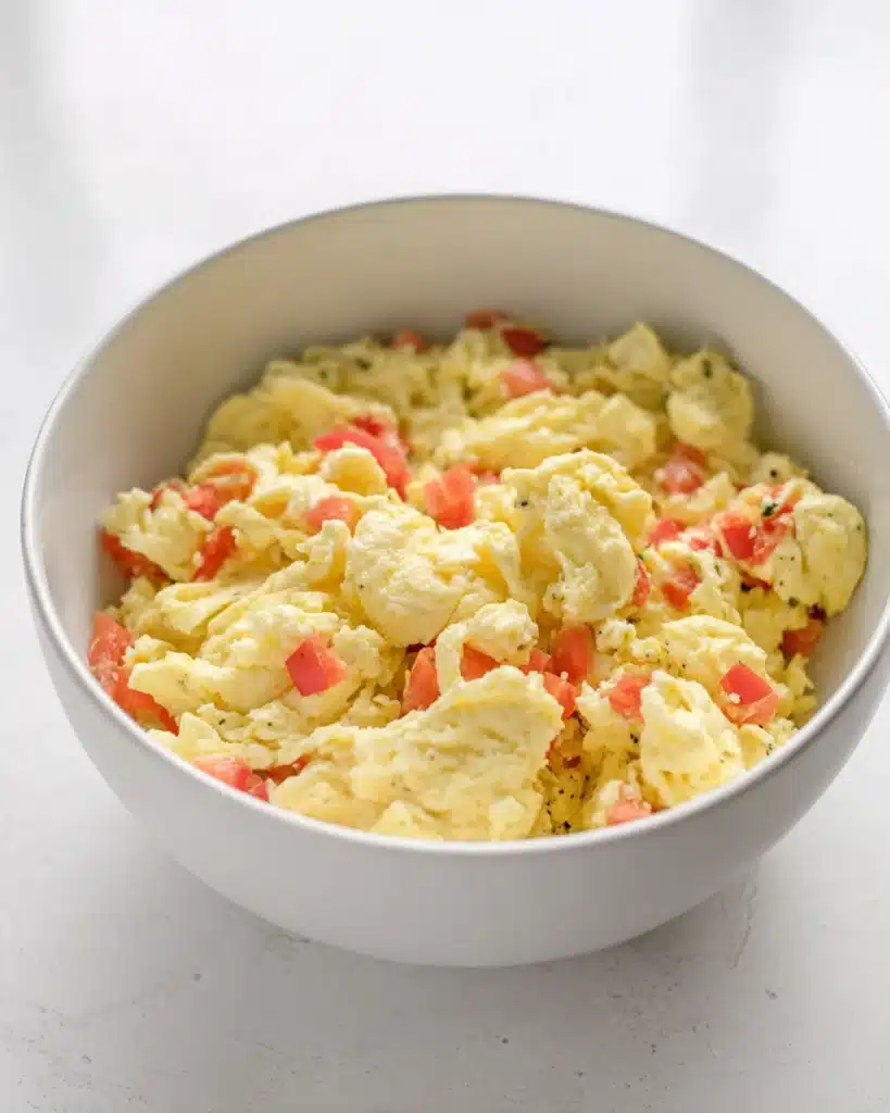 Breakfast Rolls 3 Bowl of scrambled eggs with diced red bell peppers