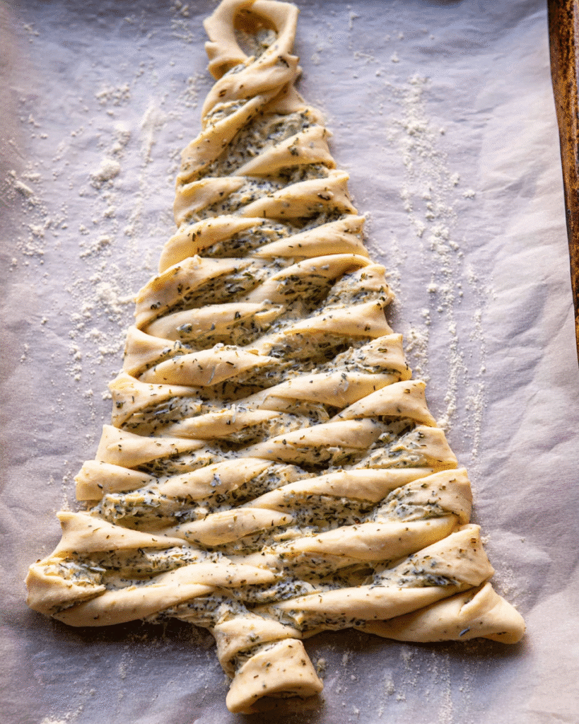Christmas Tree Garlic Bread Recipe 4 Unbaked twisted dough shaped into a Christmas tree garlic bread