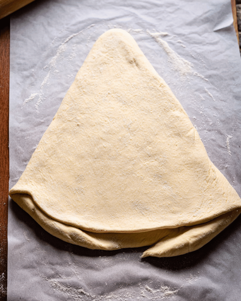 Christmas Tree Garlic Bread Recipe 3 Christmas tree garlic bread dough triangle on parchment paper