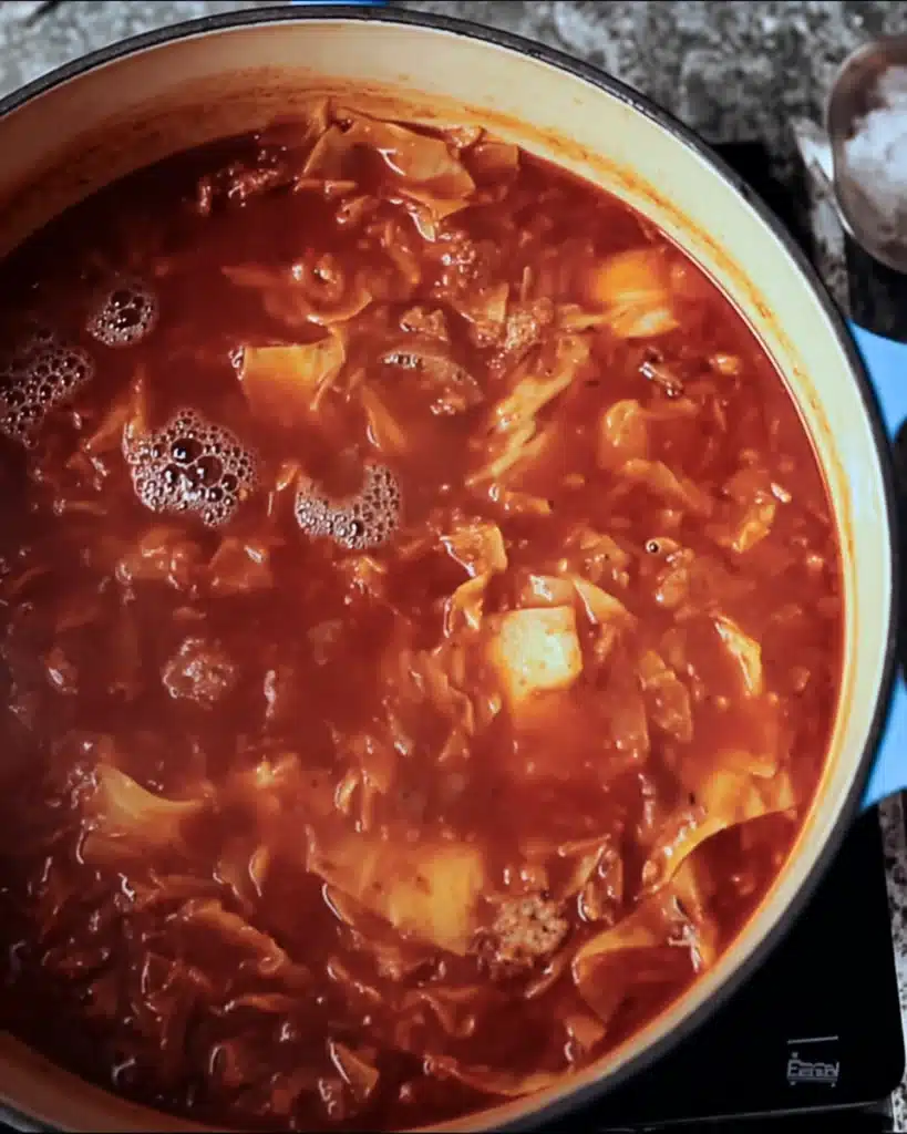 Golumpki Soup (Stuffed Cabbage Soup) – A Hearty Polish Classic Made Easy 8 Golumpki Soup simmering in rich tomato broth with cabbage and sausage