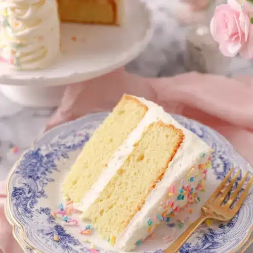 Vanilla Cake Recipe with maple syrup and blueberries on a rustic plate