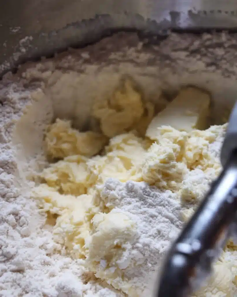 Whipped Shortbread Cookies (Melt-in-Your-Mouth Christmas Classic) 3 Mixing flour into creamed butter for whipped shortbread cookies