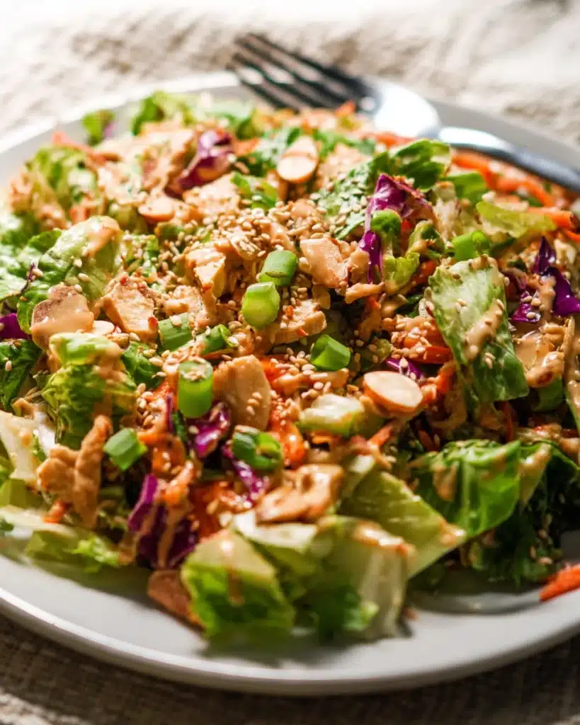 Whole30 Chinese Chicken Salad (Paleo, Gluten-Free) 1 Whole30 Chinese chicken salad with cabbage, carrots, almonds, and sesame dressing