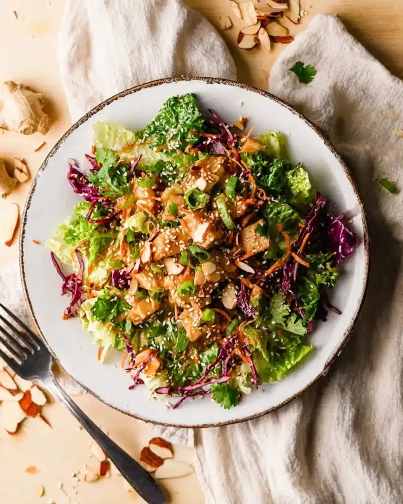 Whole30 Chinese Chicken Salad (Paleo, Gluten-Free) 4 Whole30 Chinese chicken salad plated with cabbage, carrots, and sesame dressing