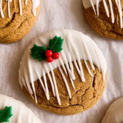 Chewy Maple Cinnamon Cookies with White Chocolate Drizzle (Christmas Favorite) 6 Chewy maple cinnamon cookies dipped in white chocolate with holly berry sprinkles