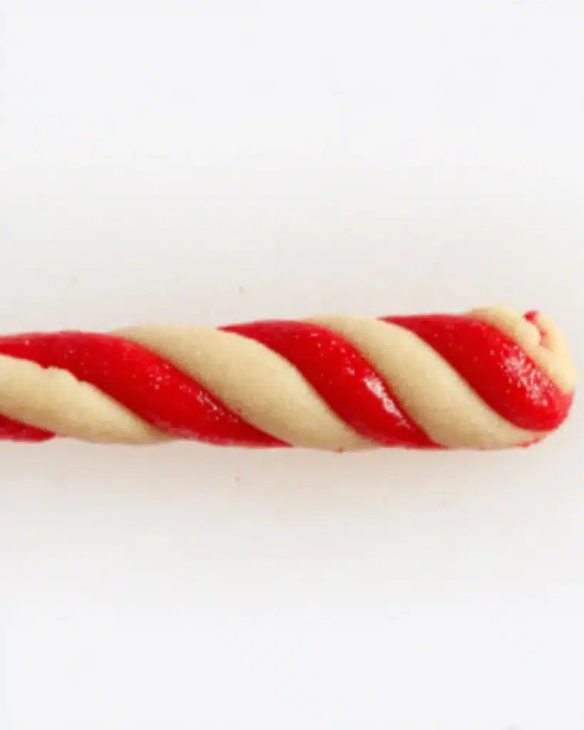 Christmas Candy Cane Cookies Recipe 2 Red and white twisted cookie dough rope for Christmas Candy Cane Cookies