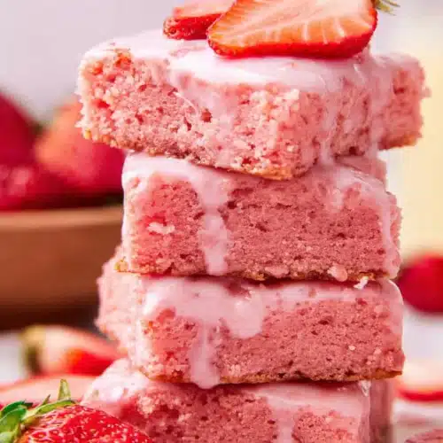 Easy Strawberry Brownies 5 Stack of glazed Easy Strawberry Brownies with fresh strawberries
