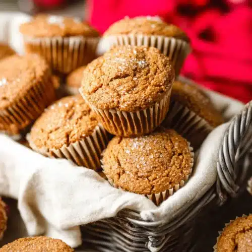 Gingerbread Muffins 7 Freshly baked gingerbread muffins with sugar topping in a rustic basket
