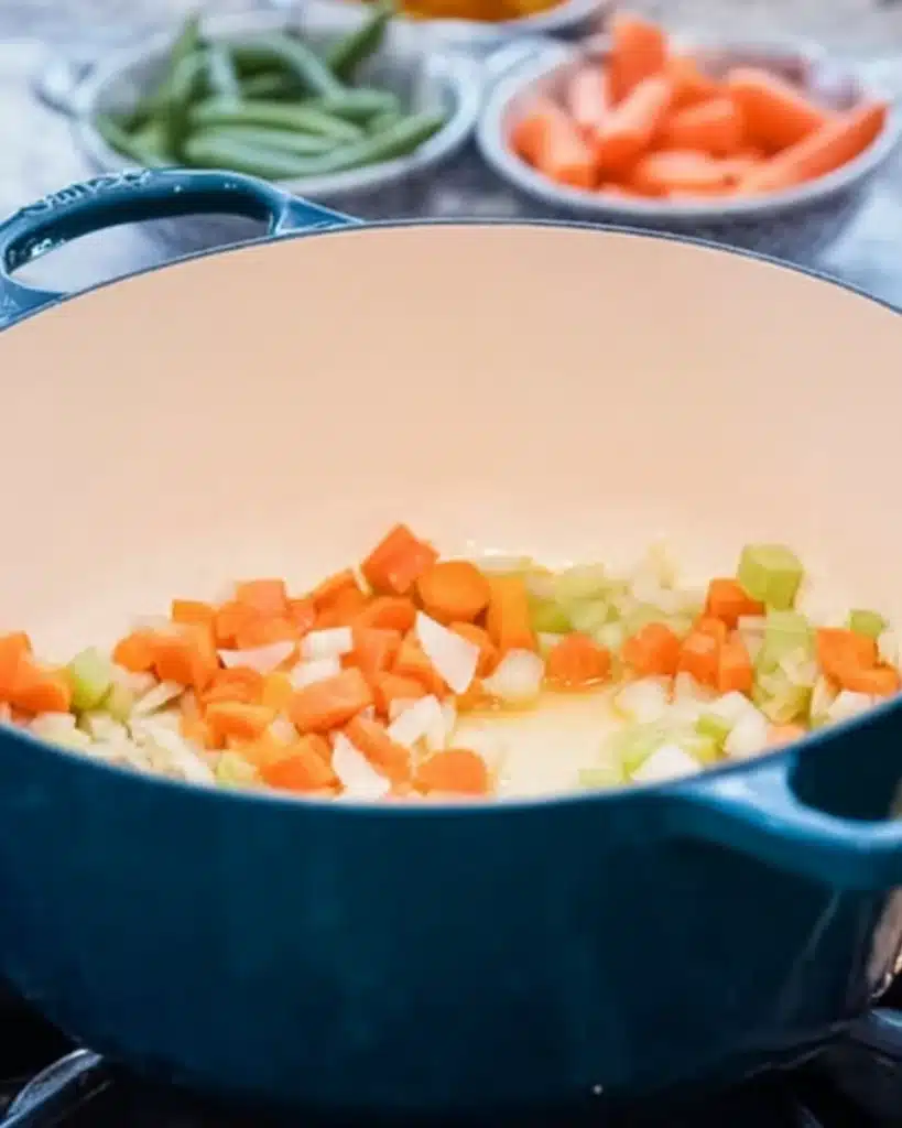 Maryland Crab Soup 2 Sautéing onions, carrots, and celery in a Dutch oven for Maryland Crab Soup