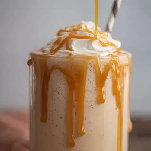McDonald’s Caramel Frappe (Easy Copycat Recipe) 4 Creamy caramel frappe with whipped cream and caramel drizzle in a tall glass