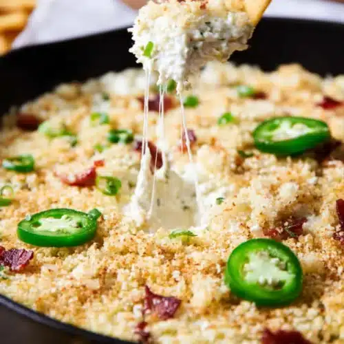 Bacon Jalapeno Popper Dip 4 Creamy bacon jalapeño popper dip with golden breadcrumb topping and melted cheese pull