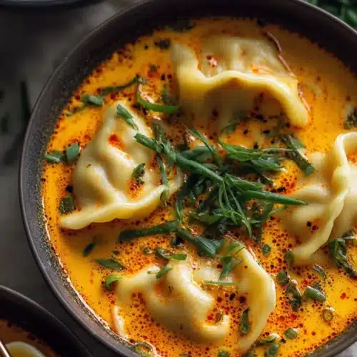 Quick Coconut Curry Soup with Dumplings and scallions