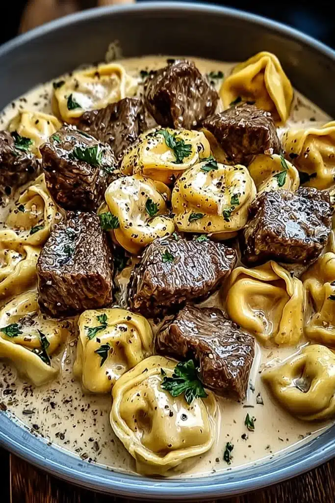 Cracked Garlic Steak Tortellini Irresistible Creamy Dinner 1 Cracked Garlic Steak Tortellini with creamy parmesan sauce and seared beef