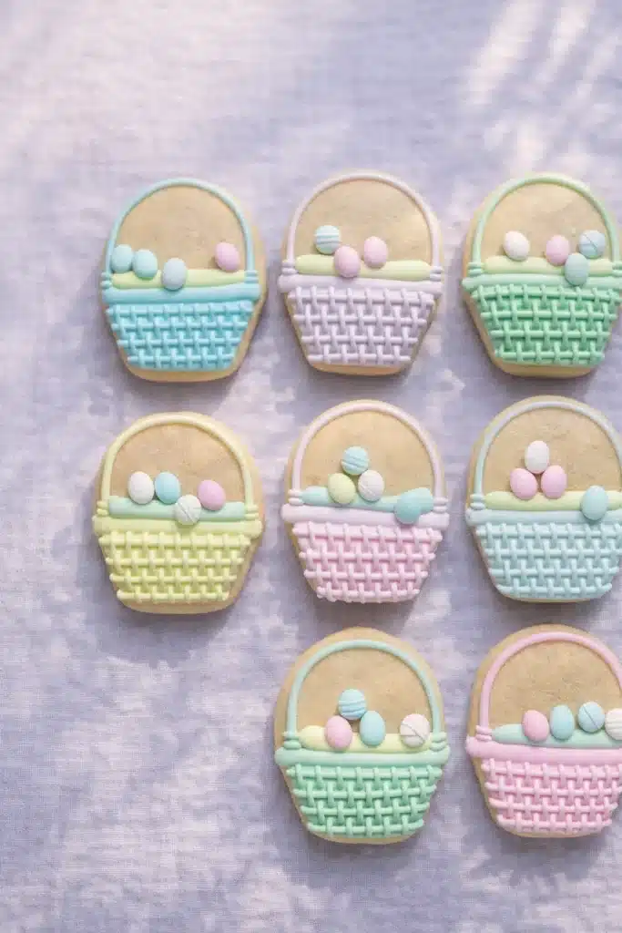 Easter Sugar Cookies 3 Pastel Easter basket sugar cookies decorated with royal icing and candy eggs