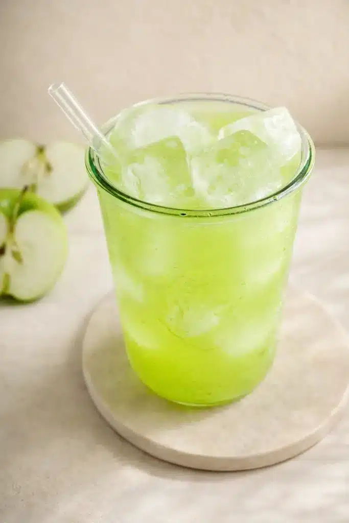 Natures Gatorade Recipe That’s Simple, Fresh, and Healthy 3 Green Apple Natures Gatorade served over ice in a glass jar