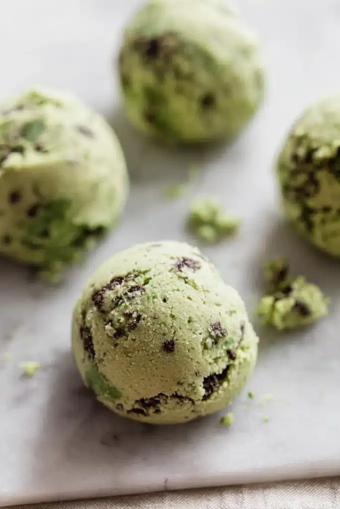 Oreo Shamrock Shake Cookies 3 Pistachio chocolate chunk cookie dough balls on baking sheet