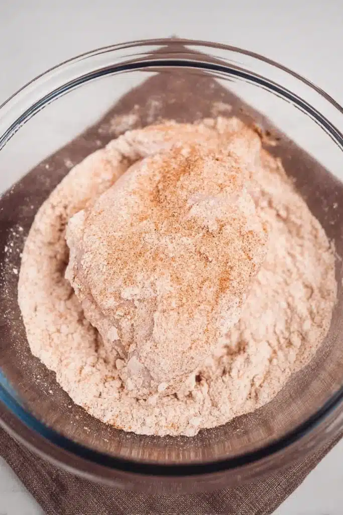 Chicken Paprikash Recipe: Creamy, Cozy, and Easy Dinner 2 Chicken Paprikash chicken coated in seasoned flour before cooking