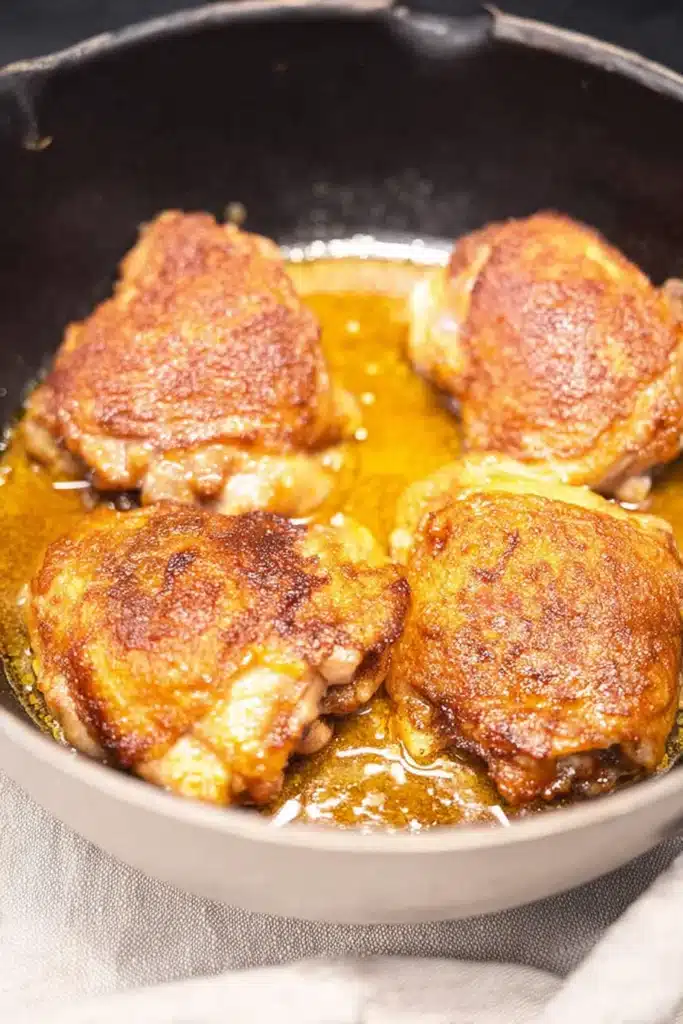 Chicken Paprikash Recipe: Creamy, Cozy, and Easy Dinner 3 Chicken Paprikash chicken browning in pan with crispy golden sear