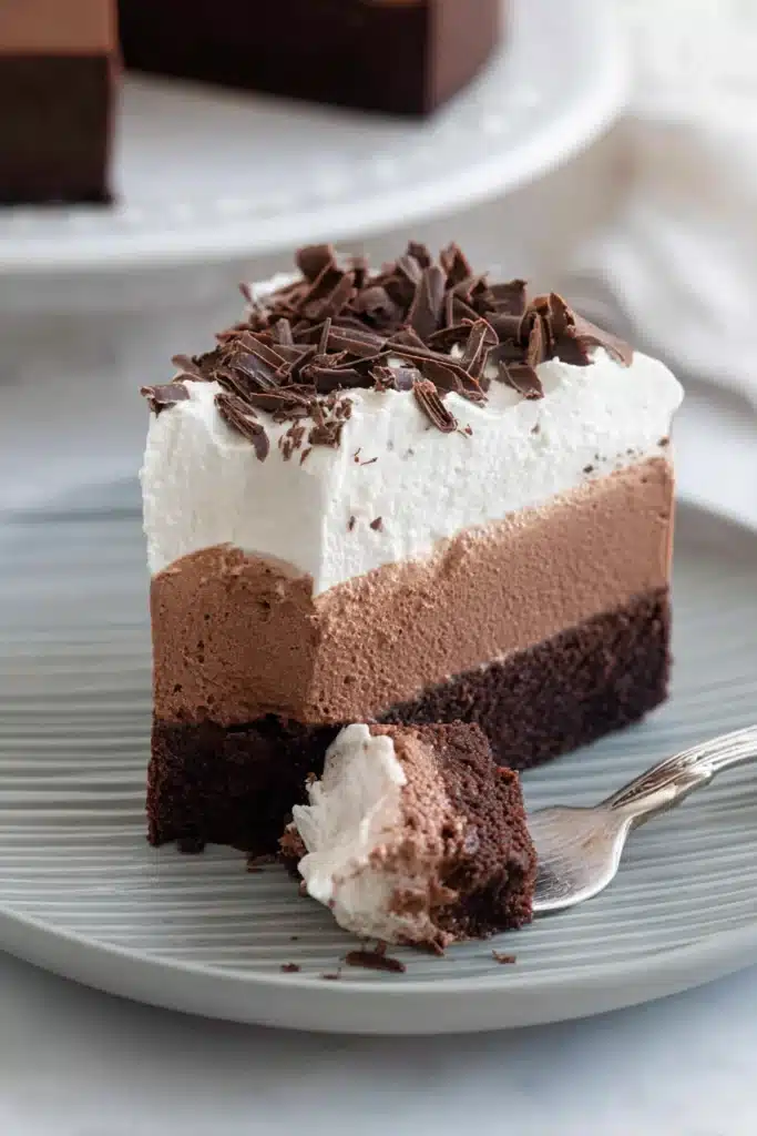 Gluten-Free Chocolate Mousse Cake slice with fork showing creamy layers