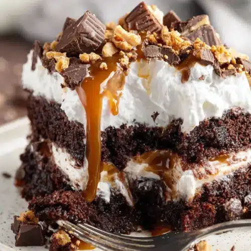 Vintage Better Than Sex Cake 4 Vintage Better Than Sex Cake slice with caramel, whipped topping, and toffee pieces