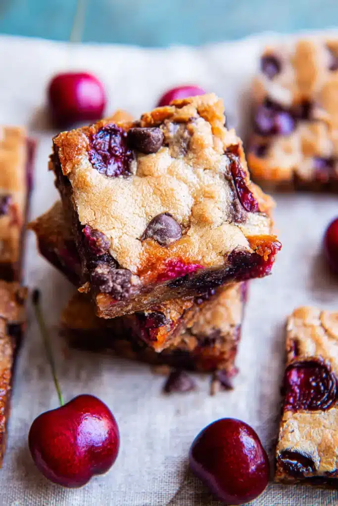 Chocolate Chip Cherry Bars Recipe Easy and Delicious Treat 3 Chocolate Chip Cherry Bars with gooey center and fresh cherries on top