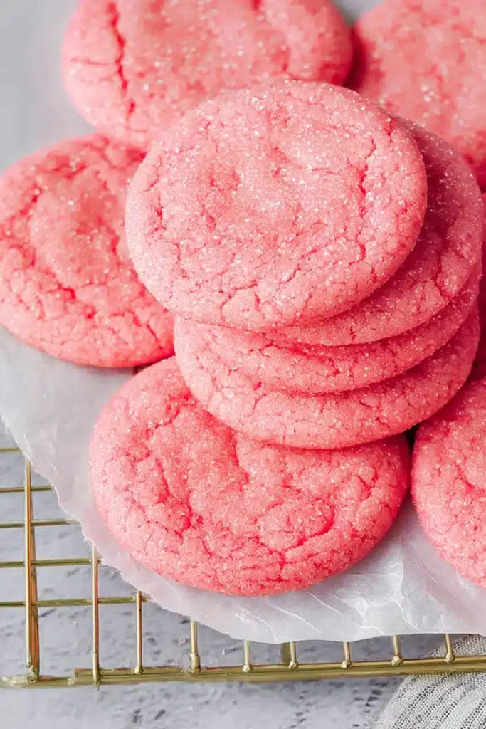 Mexican Pink Cookies Recipe That’s Soft, Buttery, and Easy 3 Mexican Pink Cookies baked with sugar topping on cooling rack