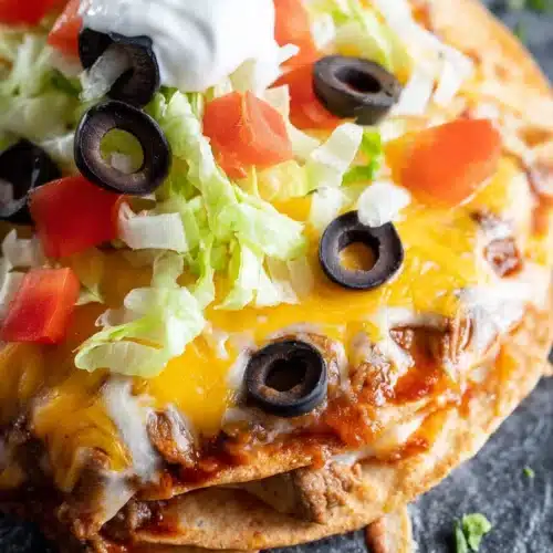 Taco Bell Mexican Pizza with melted cheese, beef, and fresh toppings