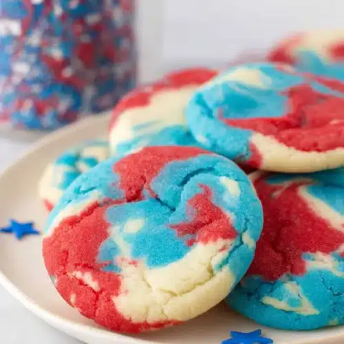 Patriotic Sugar Cookies with red white and blue swirls on a plate
