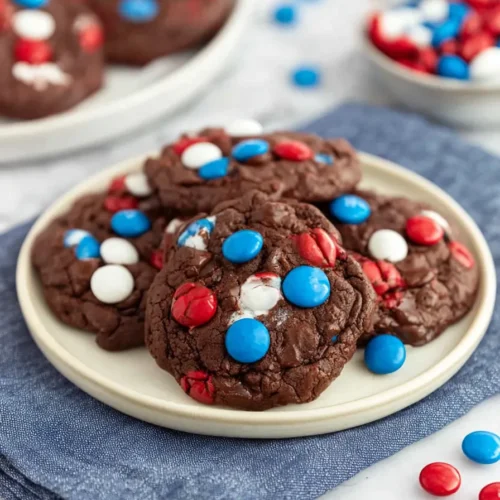 4th of July Cookies 5 4th of July brownie cookies with red white and blue candies on a plate