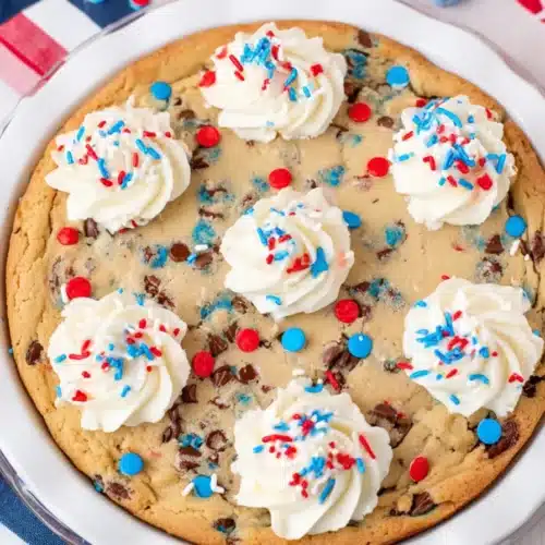 4th of July Cookie Cake with patriotic frosting and colorful sprinkles