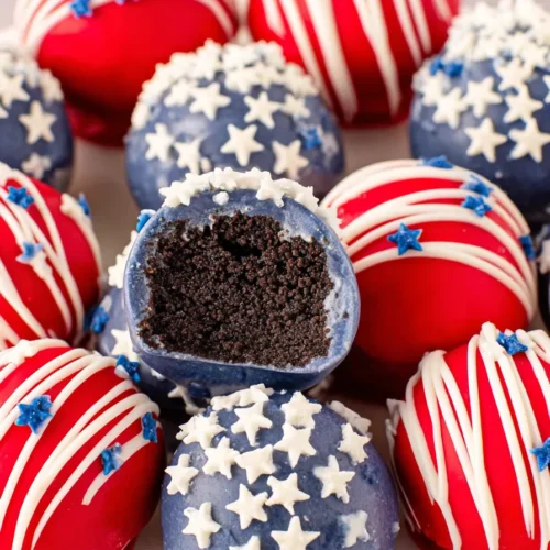 4th Of July Oreo Balls 6 4th Of July Oreo Balls with red coating and blue patriotic sprinkles