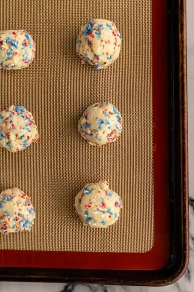 4th of July Sprinkle Cookies dough scoops on a baking sheet