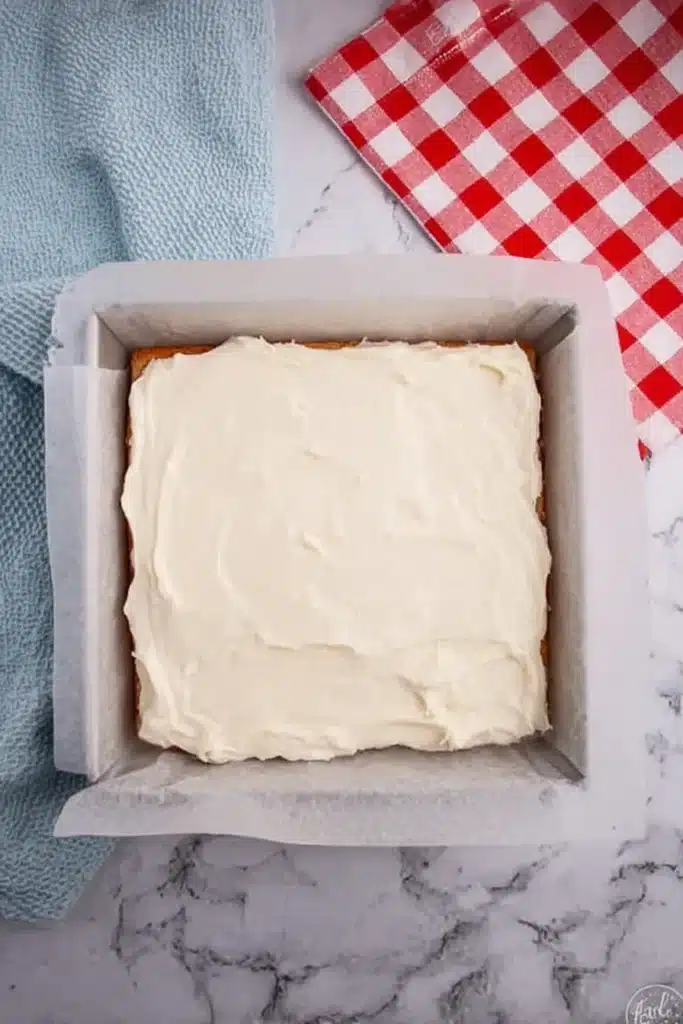 Patriotic Sugar Cookie Bars for the Perfect 4th of July Dessert 4 Patriotic sugar cookie bars with creamy frosting in baking pan