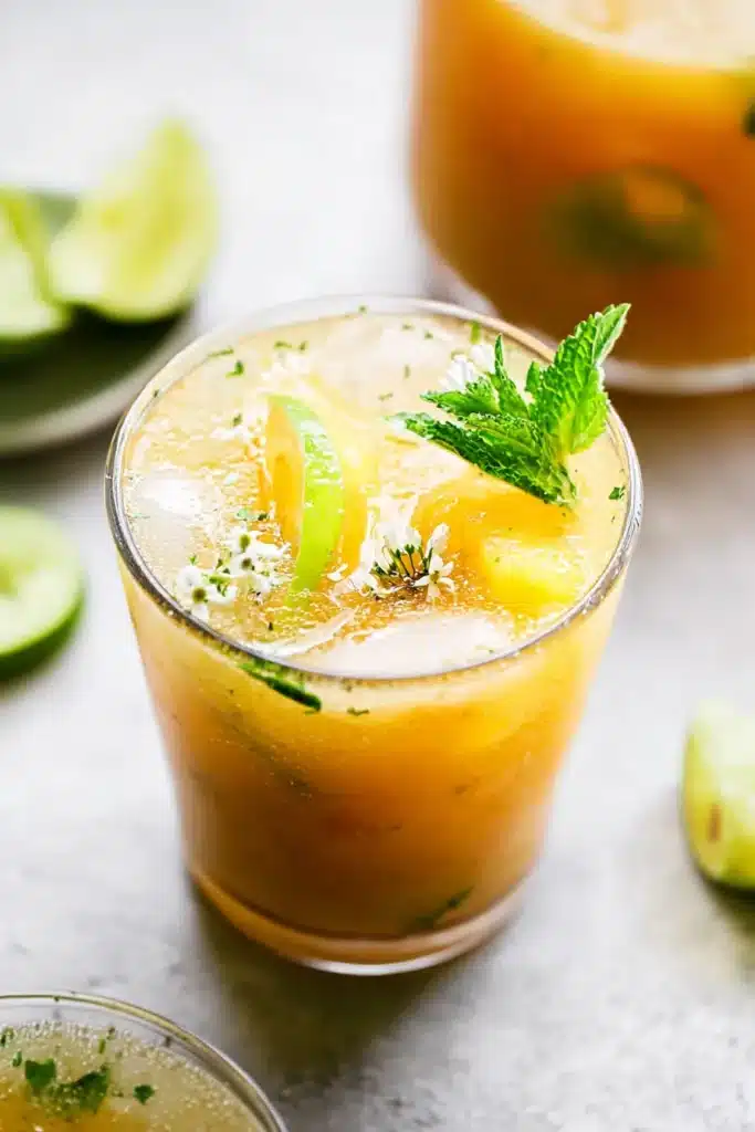 Apple Cider Vinegar Drink served over ice with lime and mint