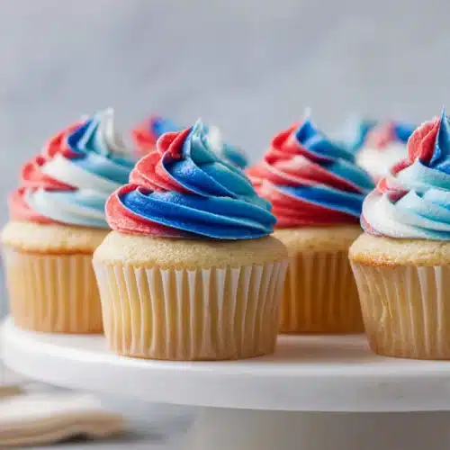 Patriotic Cupcakes 6 Patriotic cupcakes with red white and blue frosting for Fourth of July parties