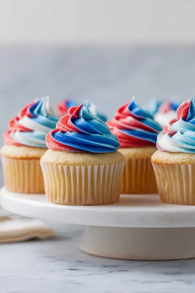 Patriotic Cupcakes 1 Patriotic cupcakes with red white and blue frosting for Fourth of July parties