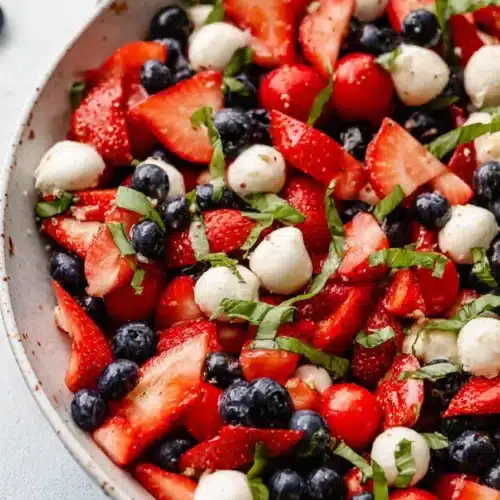 Red White and Blue Caprese Salad 4 Red White and Blue Caprese Salad with strawberries blueberries mozzarella and tomatoes