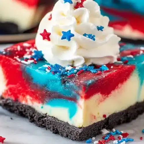 Red White and Blue Cheesecake Bars 5 Red White and Blue Cheesecake Bars with Oreo crust and whipped cream