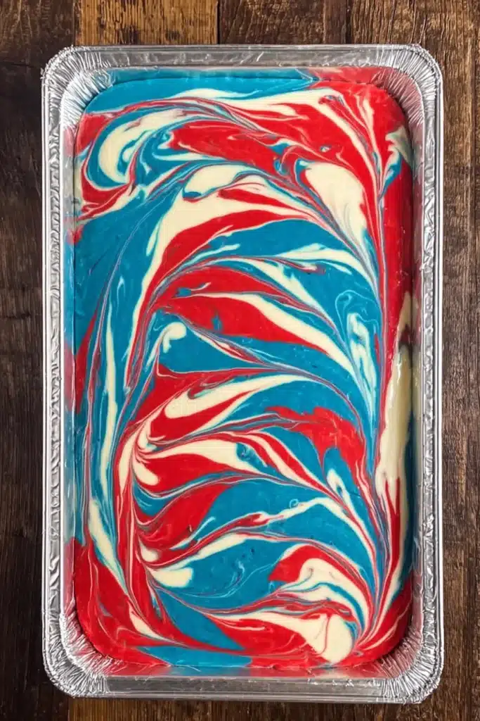 Red White and Blue Cheesecake Bars 3 Swirled Red White and Blue Cheesecake Bars batter before baking